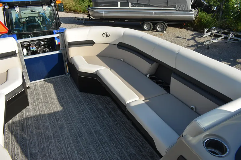 Slide: The Image of Luxurious seating on 2026 Montego Bay 8522 BR DLX pontoon boat, featuring elegant design and comfort. - 11