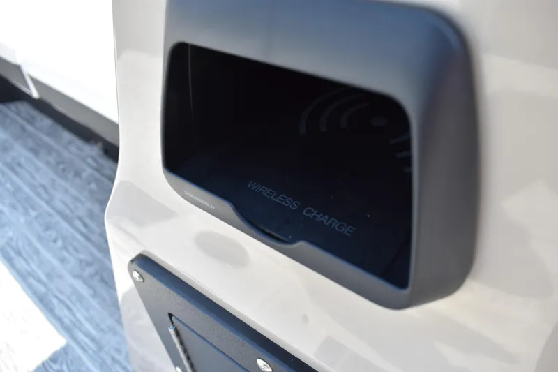 Slide: The Image of Wireless charging station on 2026 Montego Bay 8522 BR DLX boat, featuring modern design. - 15
