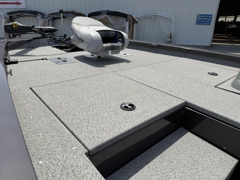Slide: The Image of 2024 G3 Sportsman 1810sc boat deck with gray carpet. - 11