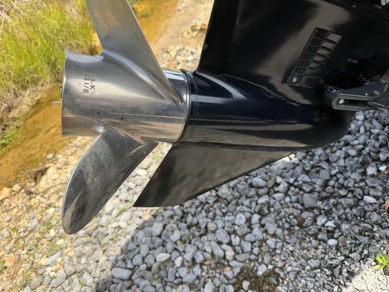 Slide: The Image of 2024 G3 Sportsman 1810sc boat motor propeller on gravel. - 5