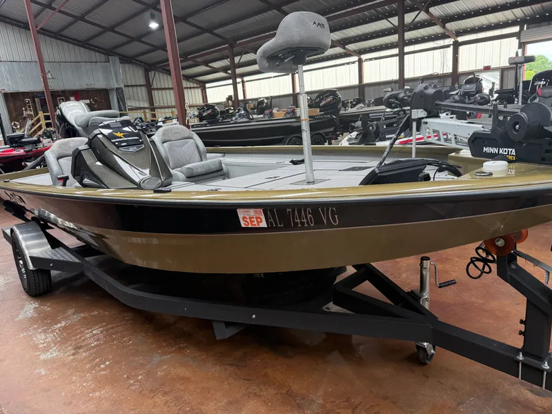 The Image of 2024 Avid 18XC boat in warehouse with trailer. - 1