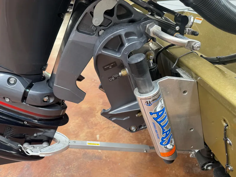 Slide: The Image of Close-up of Avid 18XC 2024 boat stern with Atlas hydraulics. - 19