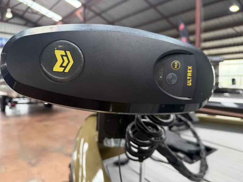 Slide: The Image of Close-up of a 2024 Avid 18XC boat with Ultrex control. - 9