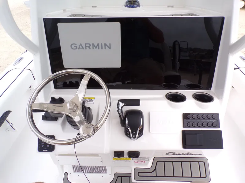 Slide: The Image of 2026 Tidewater 2500 Carolina Bay helm with Garmin display. - 36