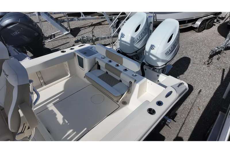 Slide: The Image of 2026 Bulls Bay 255 Center Console boat with dual Suzuki outboard engines. - 10