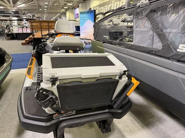 Slide: The Image of 2026 Sea-Doo FISH PRO watercraft displayed at a trade show. - 5