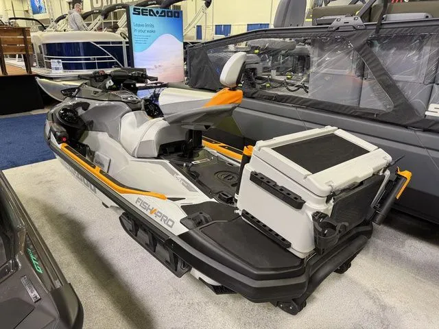 Slide: The Image of 2026 Sea-Doo FISH PRO jet ski displayed at a trade show. - 3
