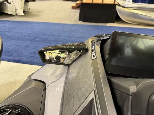 Slide: The Image of Close-up of Sea-Doo FISH PRO 2026 dashboard with mirror. - 16