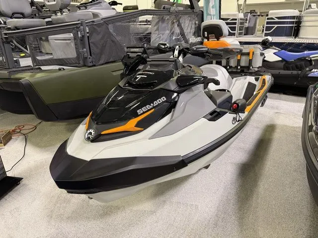 The Image of 2026 Sea-Doo FISH PRO jet ski displayed in showroom. - 1