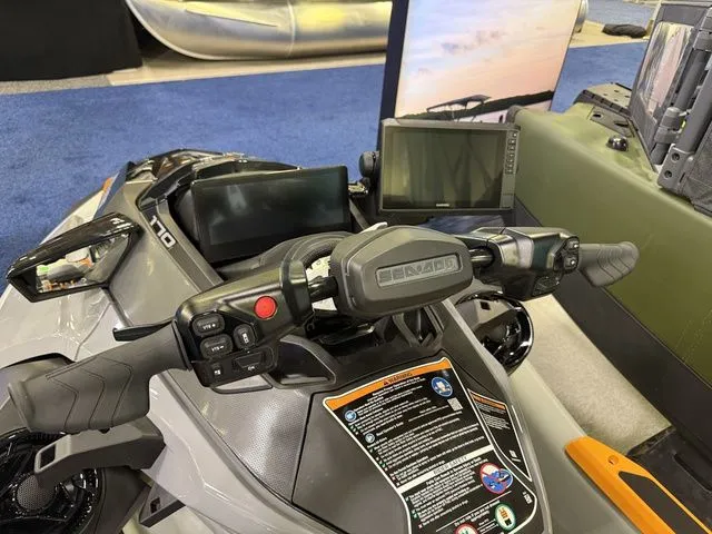 Slide: The Image of 2026 Sea-Doo FISH PRO cockpit with controls and displays. - 9