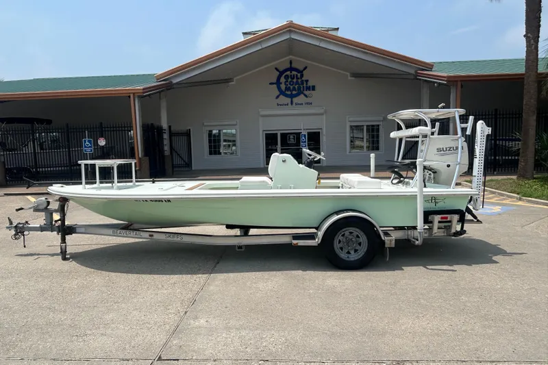 The Image of 2019 Beavertail Skiffs Mosquito boat on trailer, parked outside Gulf Coast Marine. - 0