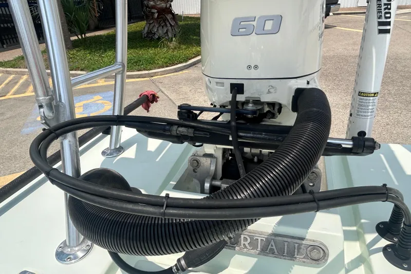 Slide: The Image of 2019 Beavertail Skiffs Mosquito with 60 HP engine, detailed view of motor and rigging. - 15