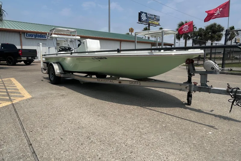 Slide: The Image of 2019 Beavertail Skiffs Mosquito boat on trailer, parked outside Everglades dealership. - 3