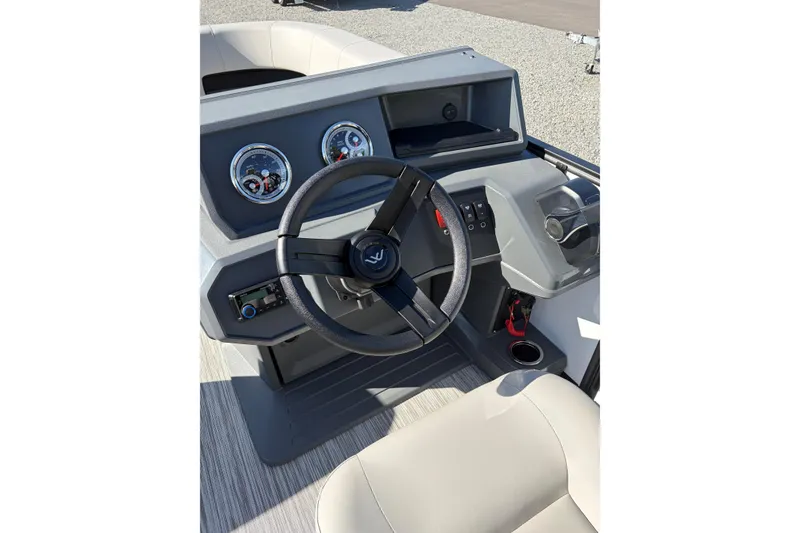 Slide: The Image of Steering console of 2026 Whisper S17 boat with gauges and controls. - 13