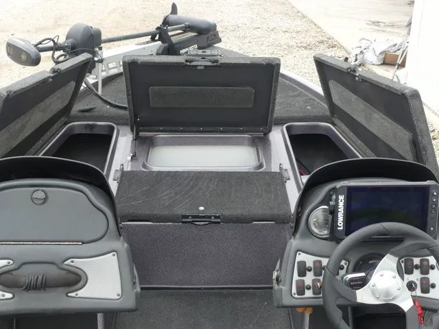 Slide: The Image of Interior view of a 2017 Skeeter TZX190 boat with control console. - 24