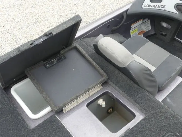 Slide: The Image of 2017 Skeeter TZX190 boat interior with storage and seat. - 26