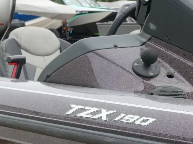 Slide: The Image of Close-up of a 2017 Skeeter TZX190 boat with gray interior. - 29