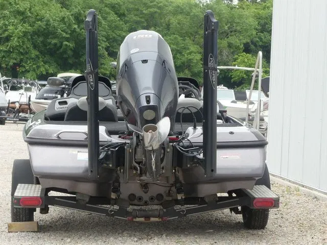 Slide: The Image of Rear view of a 2017 Skeeter TZX190 boat with outboard motor. - 6