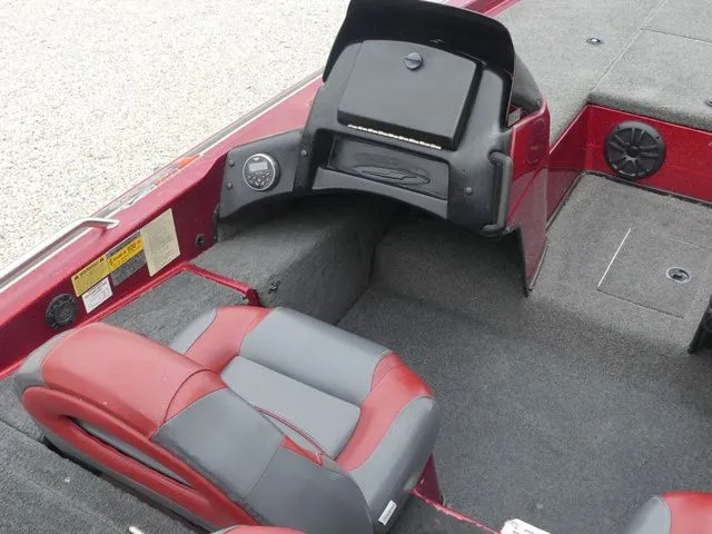 Slide: The Image of Interior of a 2000 Skeeter ZX202 boat with red and gray seating. - 20