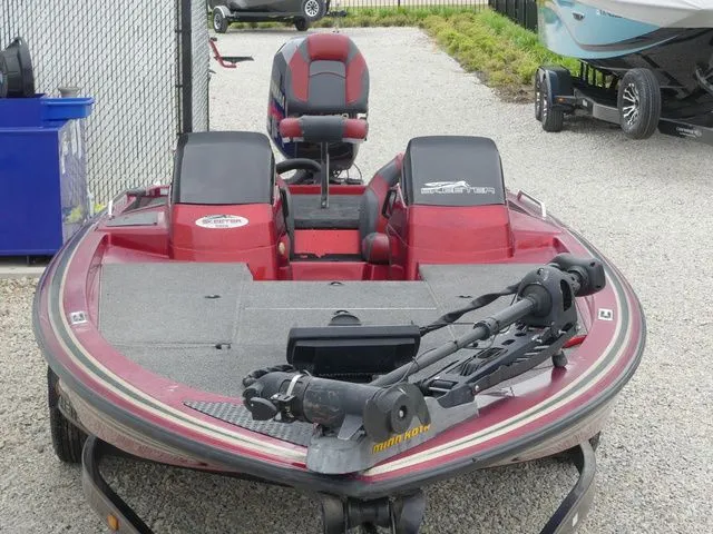 Slide: The Image of Red 2000 Skeeter ZX202 boat with Minn Kota motor. - 21