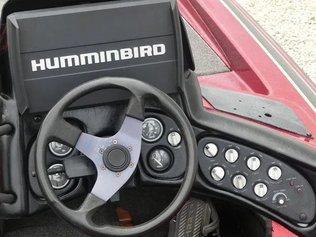 Slide: The Image of Dashboard of a 2000 Skeeter ZX202 boat with Humminbird system. - 30