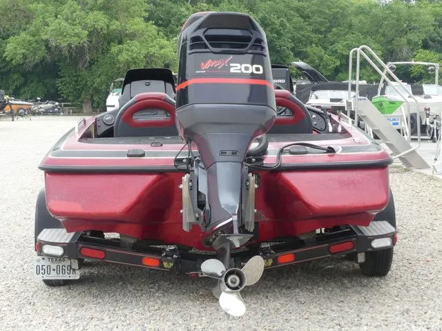 Slide: The Image of Red 2000 Skeeter ZX202 boat with Yamaha 200 HP engine. - 7