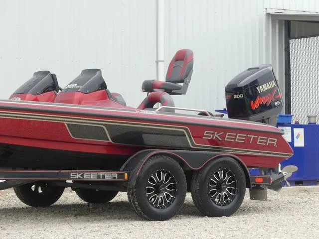 Slide: The Image of Red 2000 Skeeter ZX202 boat with Yamaha VMAX engine. - 8