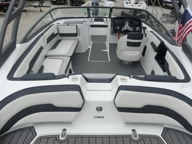 Slide: The Image of Interior of a 2019 Yamaha AR195 boat with seating. - 18