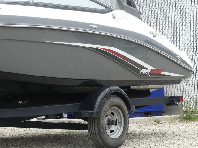 Slide: The Image of 2019 Yamaha Boats AR195 on trailer, gray design. - 5