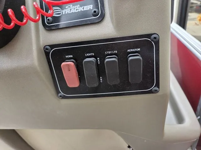 Slide: The Image of Control panel of Sun Tracker Bass Buggy 16 XL Select 2025. - 11