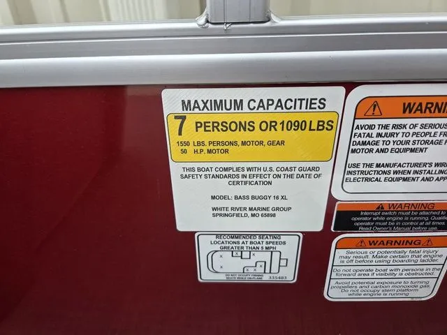 Slide: The Image of Capacity label for Sun Tracker Bass Buggy 16 XL, 7 persons or 1090 lbs. - 13
