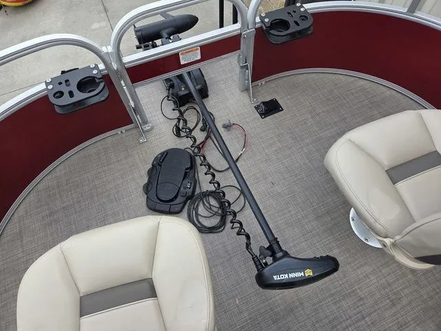 Slide: The Image of Interior of Sun Tracker Bass Buggy 16 XL Select 2025 with Minn Kota motor. - 16