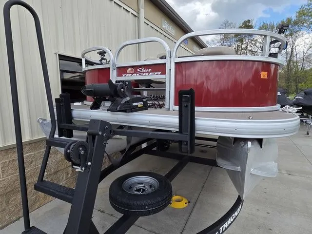 Slide: The Image of 2025 Sun Tracker Bass Buggy 16 XL Select on trailer. - 3