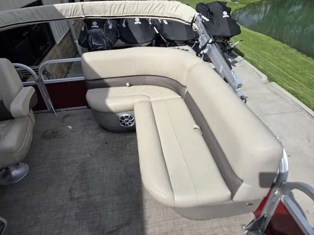 Slide: The Image of Interior of 2025 Sun Tracker Bass Buggy 16 XL Select with beige seating. - 8