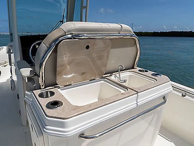 Slide: The Image of Boston Whaler 280 Dauntless 2026 with integrated sink and countertop. - 6