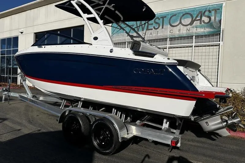 Slide: The Image of 2025 Cobalt R4 boat on trailer at West Coast Boat Center. - 2
