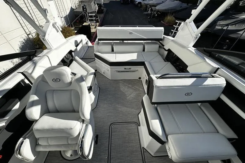 Slide: The Image of Luxurious interior of 2025 Cobalt R4 boat with plush white seating. - 6