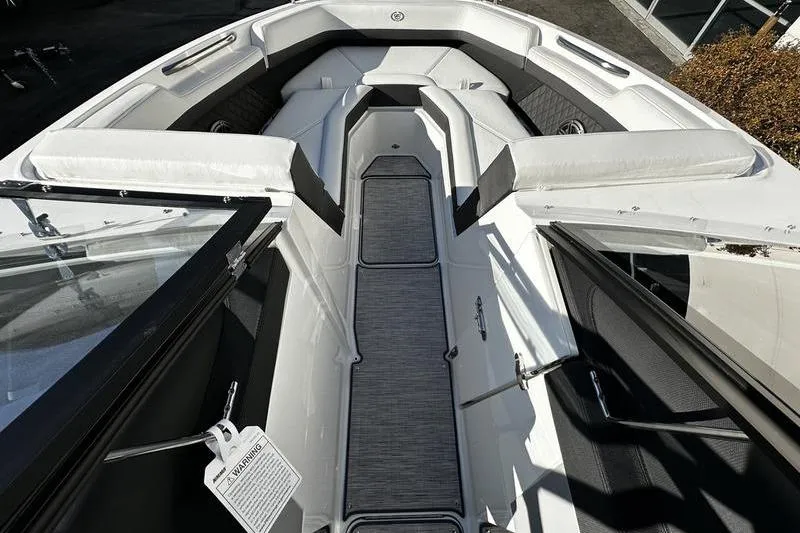 Slide: The Image of 2025 Cobalt R4 boat interior with sleek seating and modern design. - 7