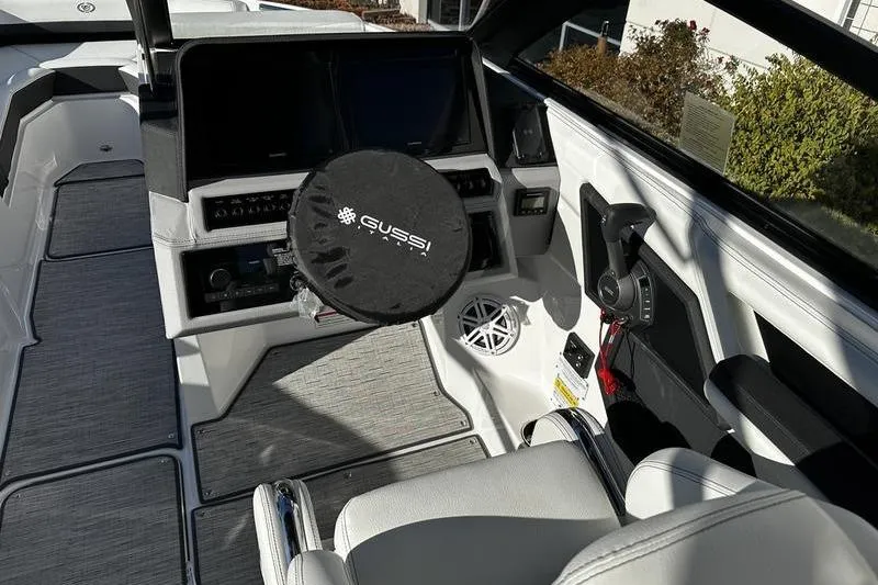 Slide: The Image of Interior of 2025 Cobalt R4 boat with Gussi steering wheel and modern controls. - 8