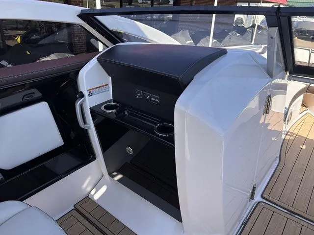 Slide: The Image of Interior of a 2021 Yamaha Boats 275SE with modern features. - 25
