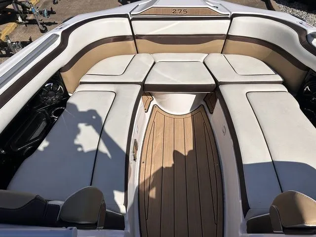 Slide: The Image of Interior of a 2021 Yamaha Boats 275SE with luxurious seating. - 26