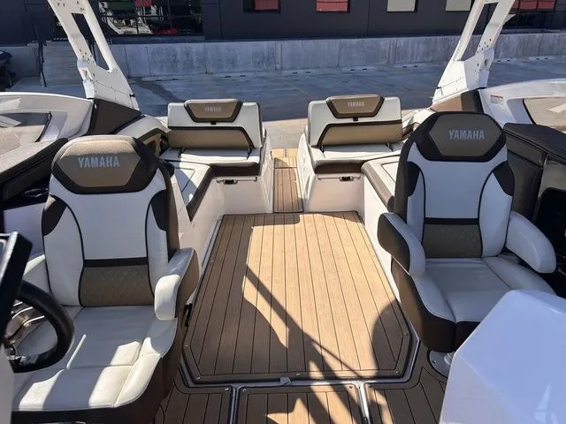 Slide: The Image of Interior of a 2021 Yamaha Boats 275SE with luxurious seating. - 29