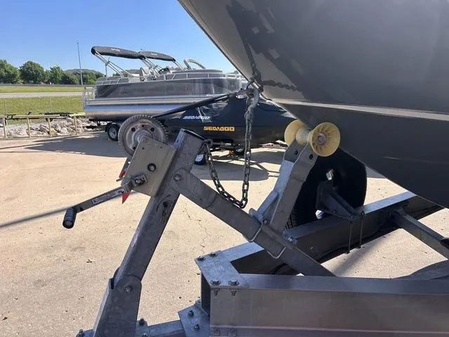 Slide: The Image of Yamaha Boats 275SE 2021 on trailer, with Sea-Doo in background. - 3