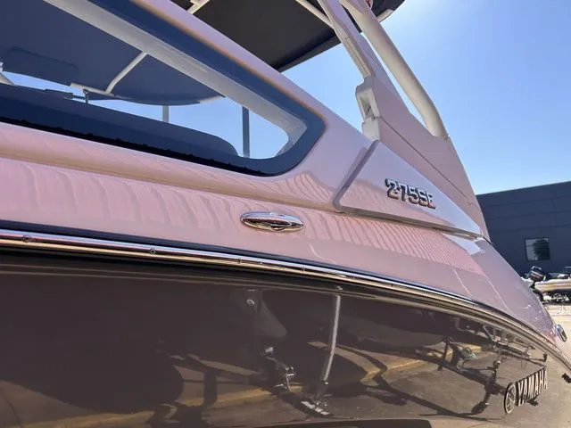 Slide: The Image of Close-up of a 2021 Yamaha Boats 275SE in sunlight. - 6