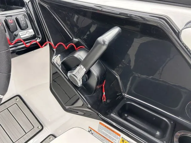 Slide: The Image of Close-up of throttle lever on a 2024 Yamaha Boats 195S. - 14