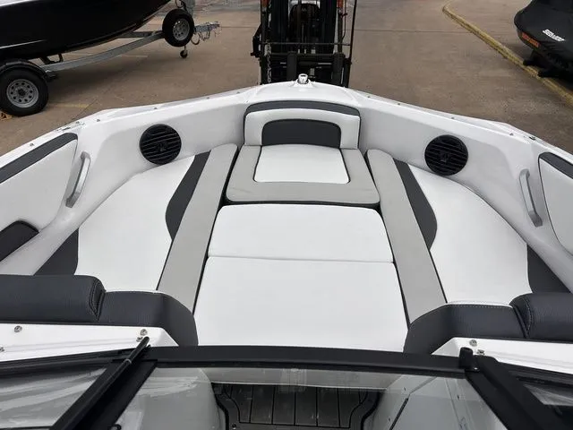 Slide: The Image of Interior of 2024 Yamaha Boats 195S with gray and white seating. - 15