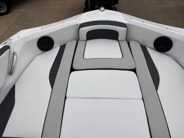 Slide: The Image of Interior of 2024 Yamaha Boats 195S with gray and white upholstery. - 16
