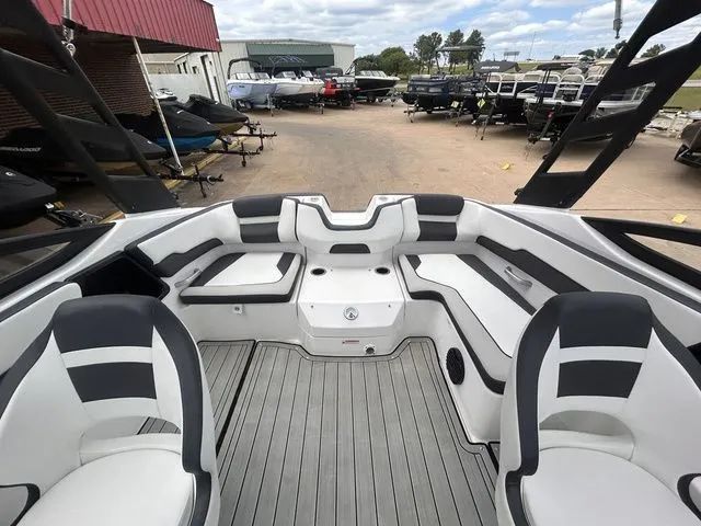 Slide: The Image of Interior of 2024 Yamaha Boats 195S with gray and white seating. - 19