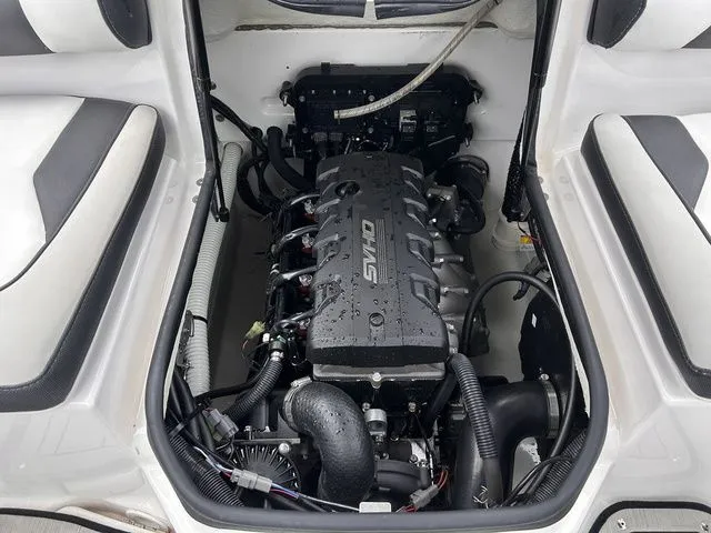 Slide: The Image of Engine compartment of 2024 Yamaha Boats 195S with powerful engine. - 21