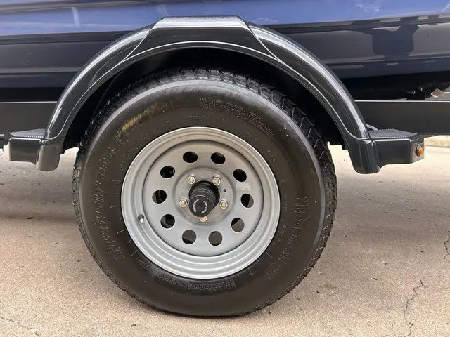 Slide: The Image of Close-up of a boat trailer wheel, Yamaha Boats 195S 2024. - 4